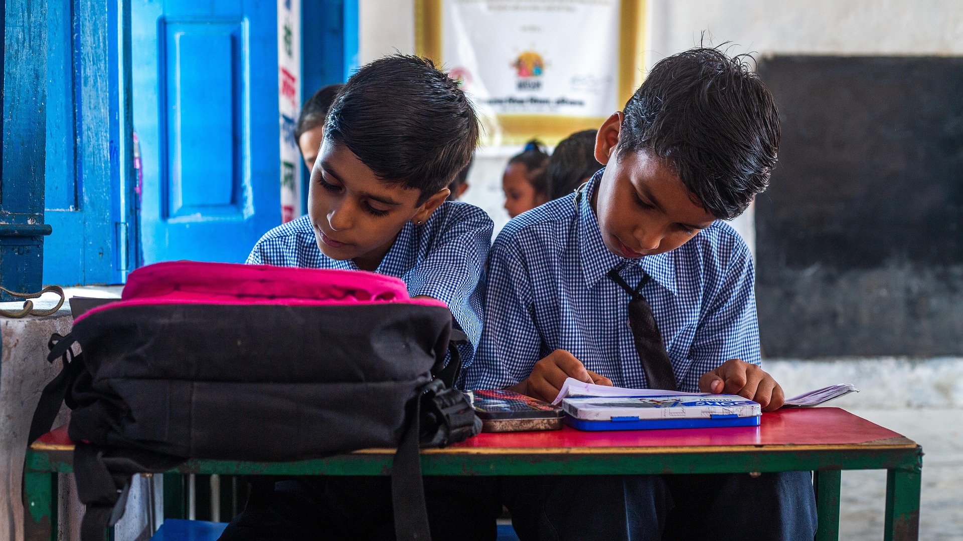 Indian girls studying in classroom